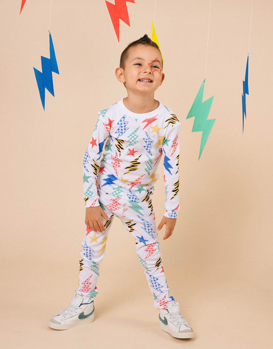 Pijama para niños y niñas en algodón peruano estampado rayos