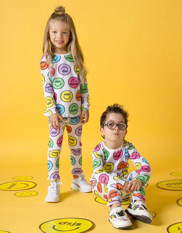 Pijama en algodón peruano unisex - estampado caras felices de colores