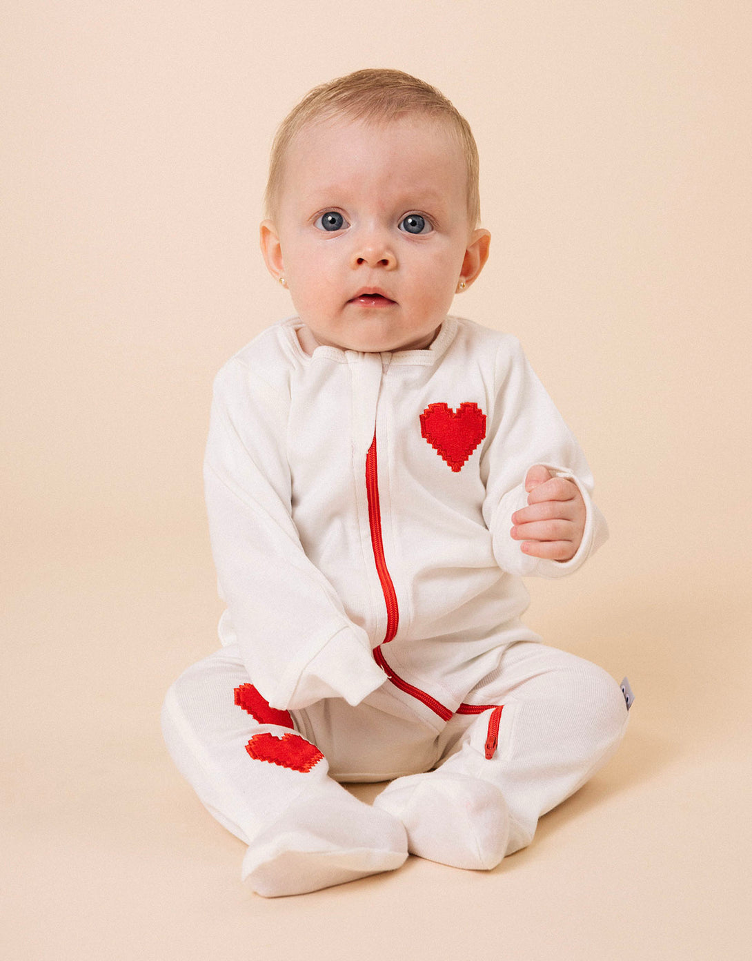 Pijama unisex para bebés en 100% algodón peruano corazones